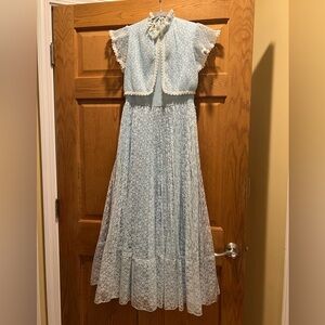 L’Enfant Vintage blue dress with lace.